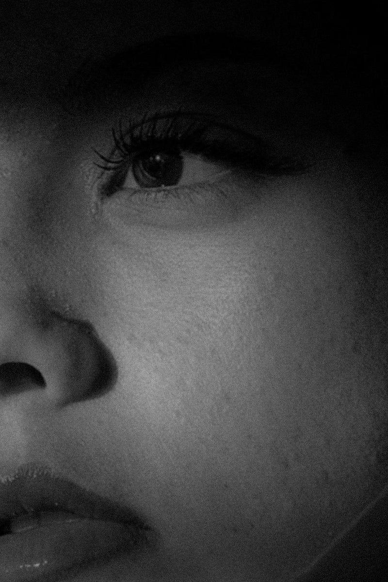 Soft close portrait of a woman's face in natural light