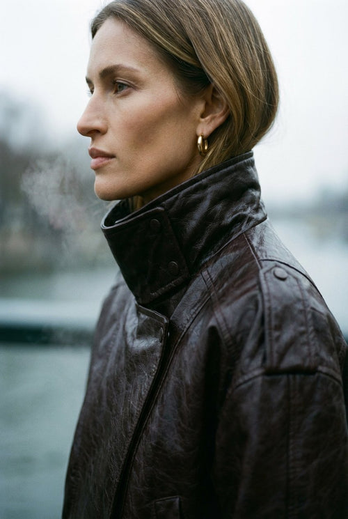 Profile of a woman in cool winter light