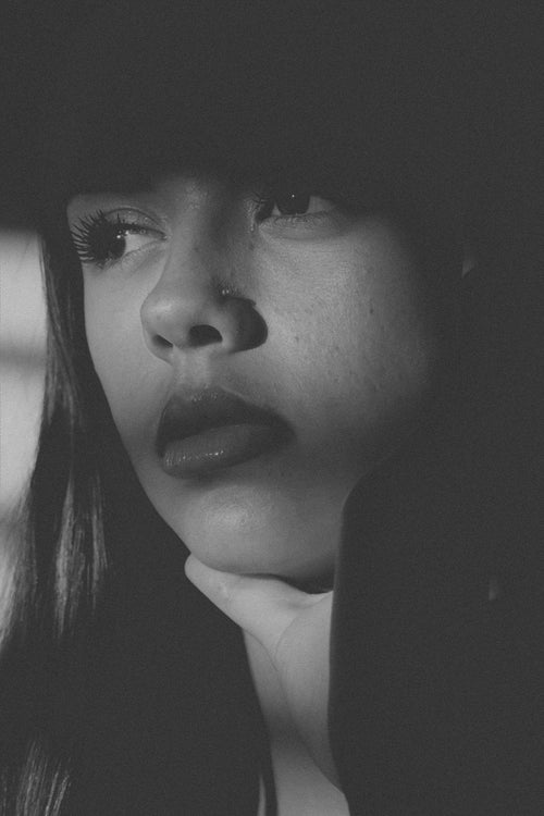 Thoughtful portrait of a woman in gentle light