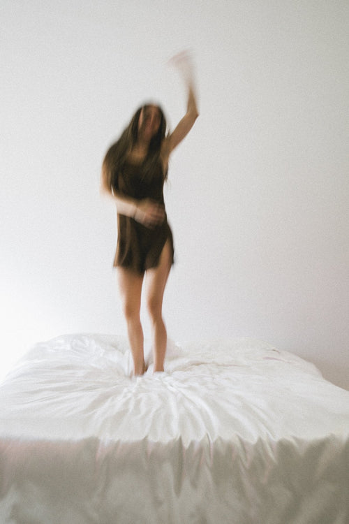 Woman enjoying a bright, sunlit morning