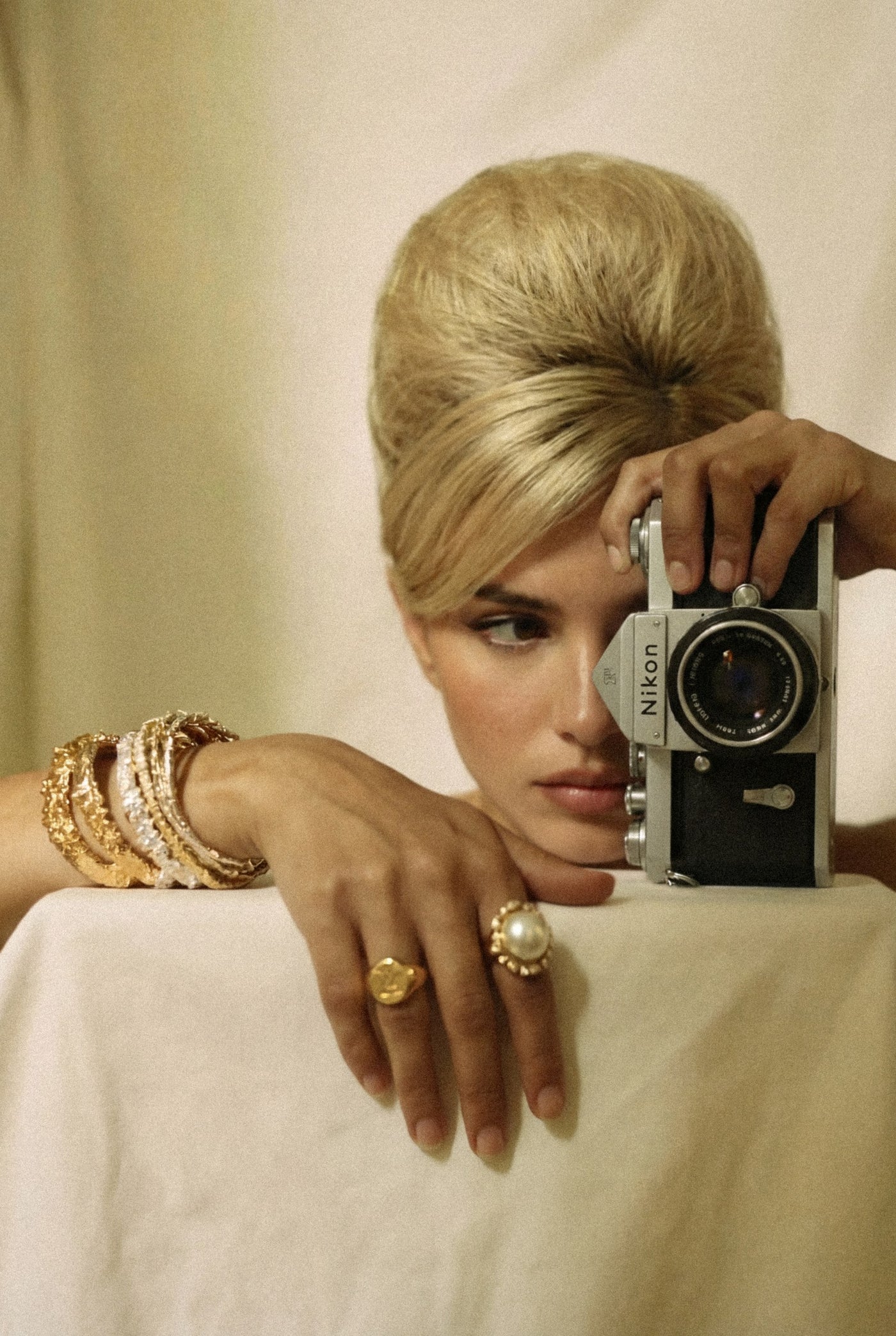Editorial portrait with a vintage camera, Anti-Ageing Treatment Packages at Pink Laser Clinics