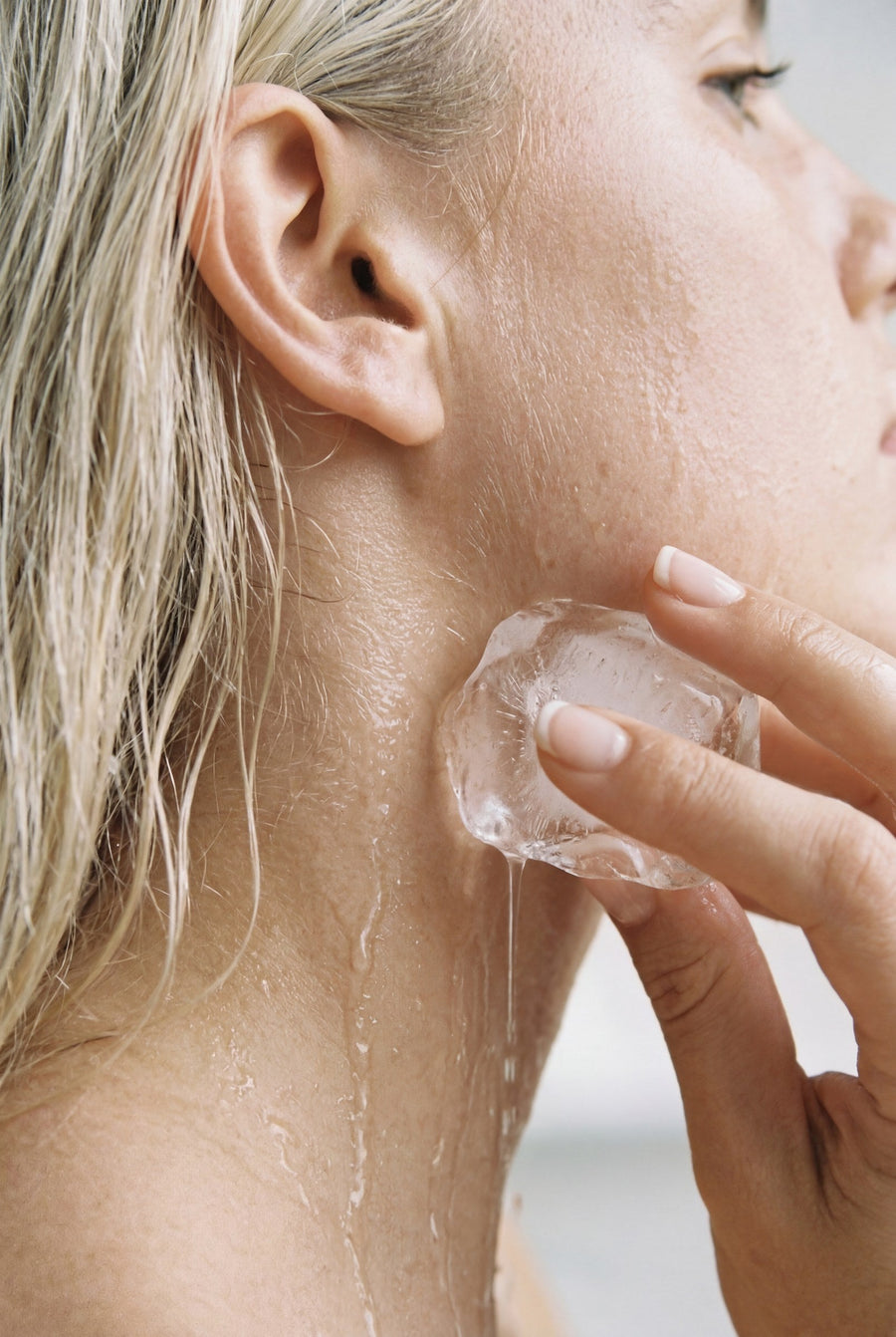 Ice pressed to the jawline, Facial Treatment Packages at Pink Laser Clinics Doncaster