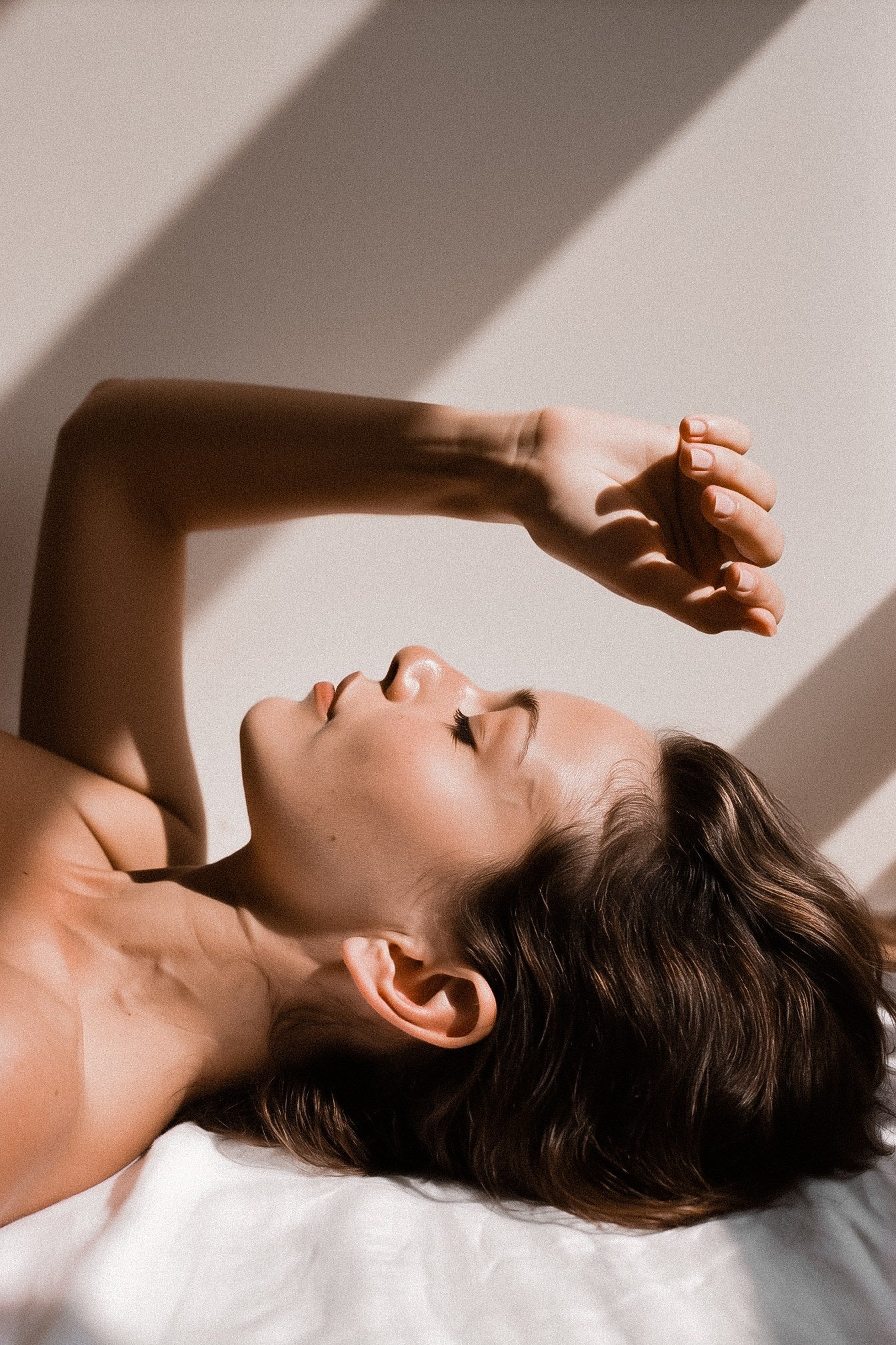 Sunlight falling across a woman's face, Pigmentation Treatment Packages at Pink Laser Clinics